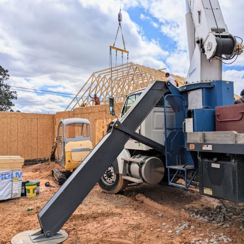 Setting multiple trusses with boom truck